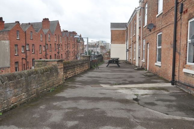 View Of The Front Of A Classic Brick Terraced Hous...