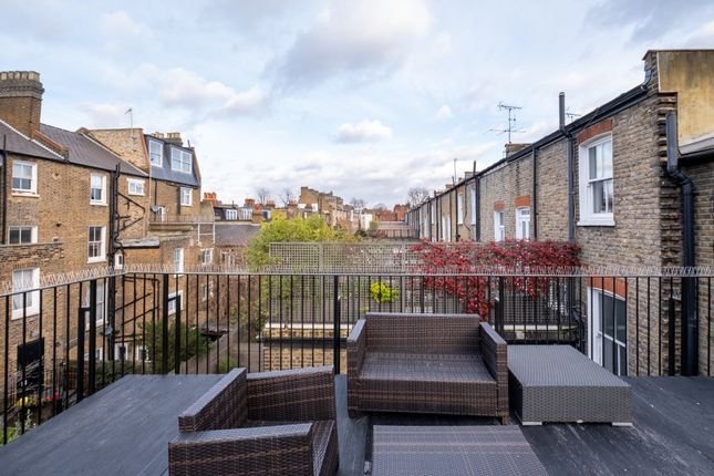 Terraced house to rent in Addison Gardens, London