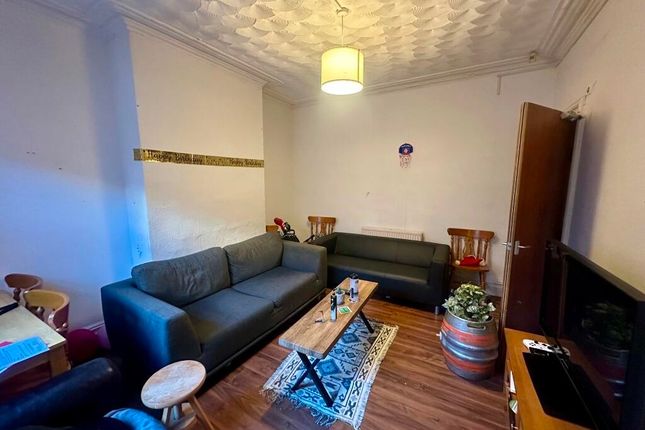 A Cozy Living Room Featuring Two Comfortable Sofas...