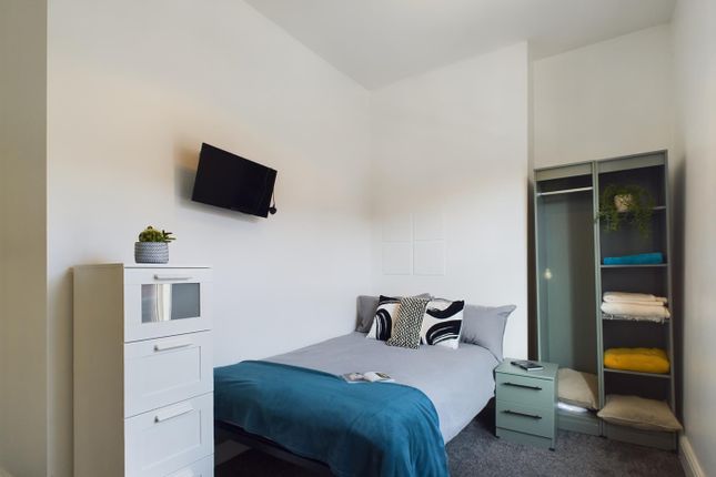 A Bright And Tidy Double Bedroom Featuring Stylish...