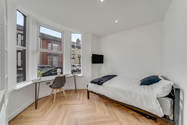 Bright And Modern Single Bedroom Featuring A Large...