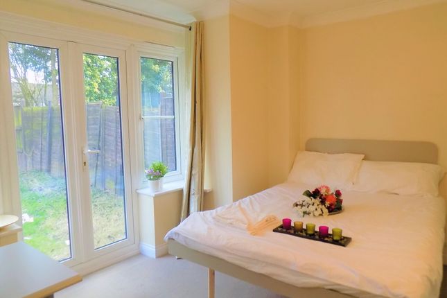 A Bright Double Bedroom Featuring A Comfortable Do...