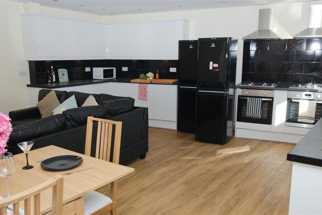 Bright Open-Plan Living And Kitchen With Modern Wh...