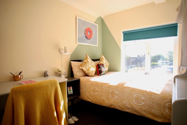 Bright And Cozy Double Bedroom Featuring A Stylish...