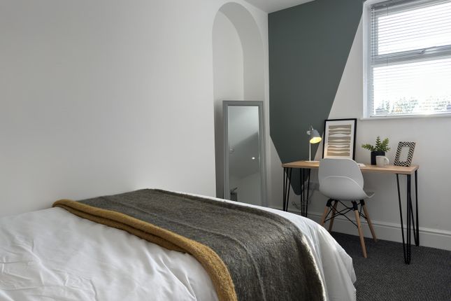 A Bright And Inviting Double Bedroom With Modern d...