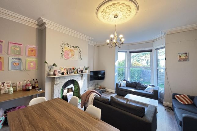 Bright And Welcoming Living Room With Ample Natura...