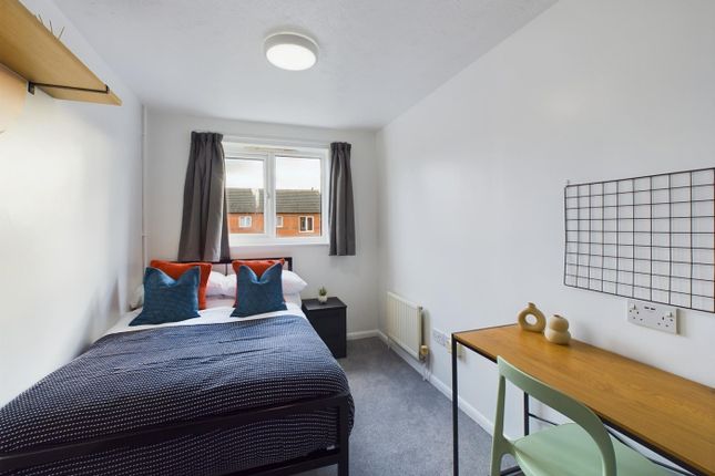 A Bright And Inviting Double Bedroom Featuring Mod...