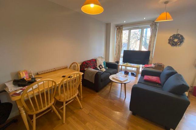 A Spacious And Modern Living Room Perfect For Soci...