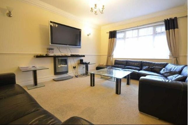 A Spacious And Well-Maintained Living Room Featuri...