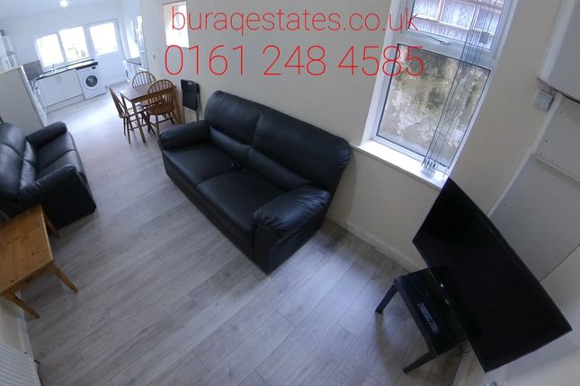 A Modern, Well-Lit Living Room Featuring A Comfort...