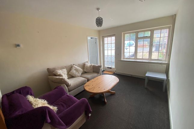 A Cozy Living Room Featuring Comfortable Seating A...