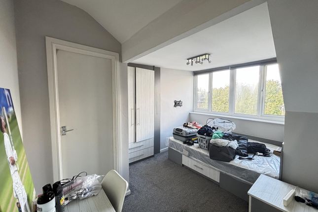 Bright And Inviting Master Bedroom With Ample Natu...