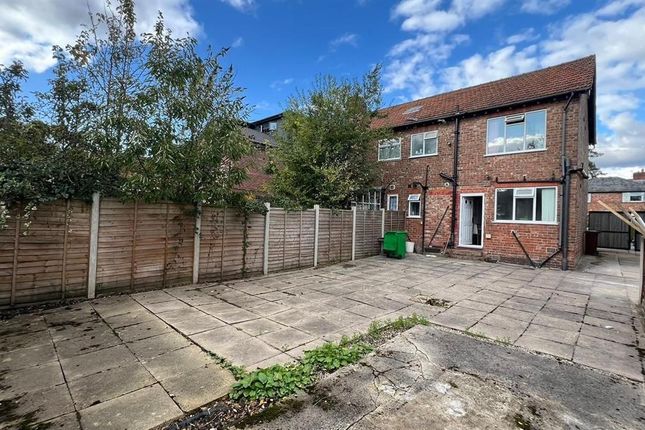 A Spacious And Well-Maintained Paved Garden Area W...