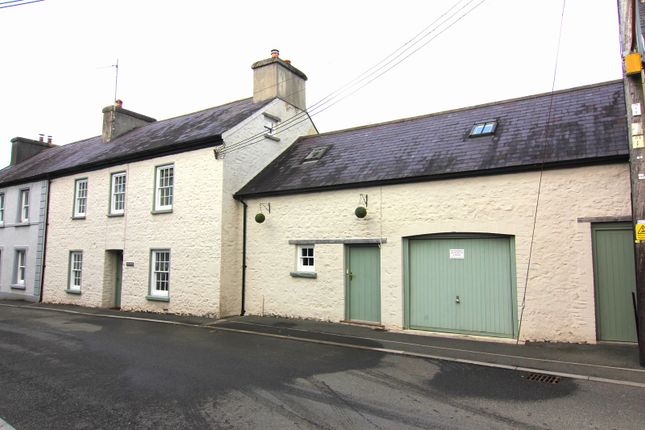 Terraced house for sale in High Street, Llangadog, Carmarthenshire.