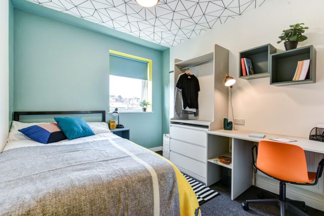 Bright, Modern Bedroom With A Comfortable Double B...