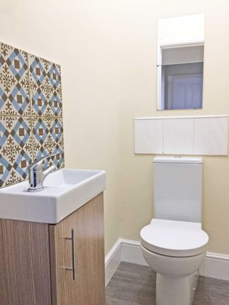 Bright, Tidy WC With A Modern Basin And Vanity Uni...