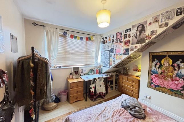 A Spacious And Well-Lit Master Bedroom Featuring A...