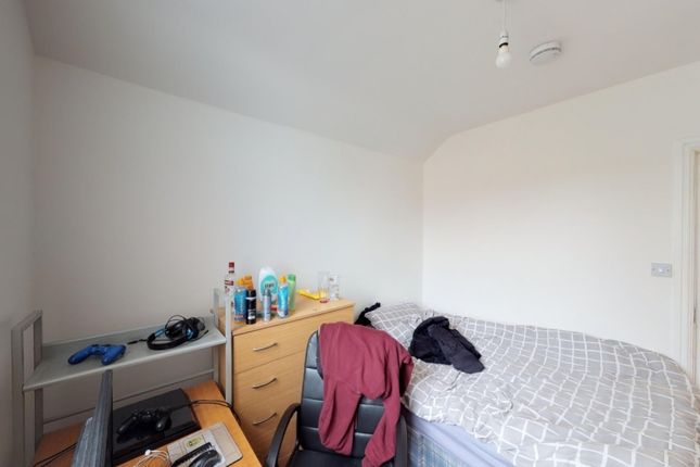 A Simple And Functional Single Bedroom Featuring A...