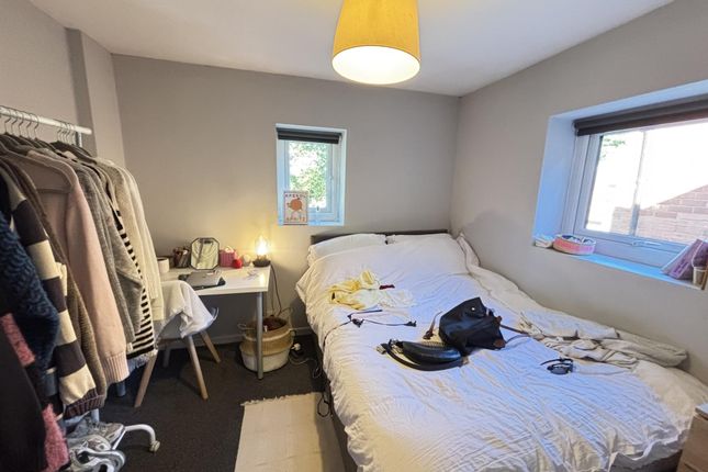 A Cozy Bedroom With A Comfortable Double Bed, Well...