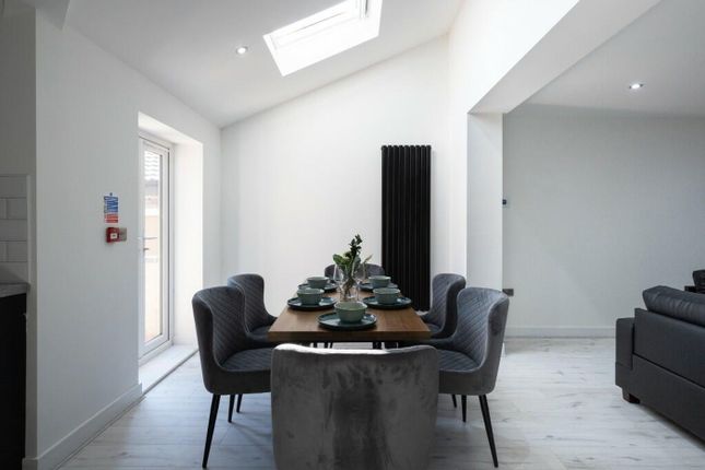 A Modern And Inviting Living Space Featuring A Sty...