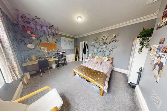 A Bright And Spacious Master Bedroom Featuring A c...