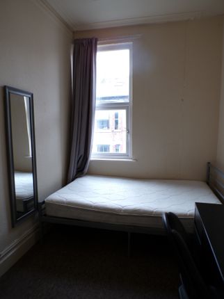 A Cozy Double Bedroom Featuring Good Natural Light...