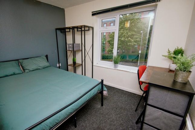 This Inviting Double Bedroom Features A Spacious l...