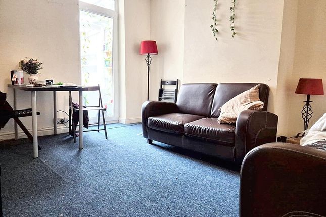 Bright, Tidy Living Room With A Comfortable Two-Se...