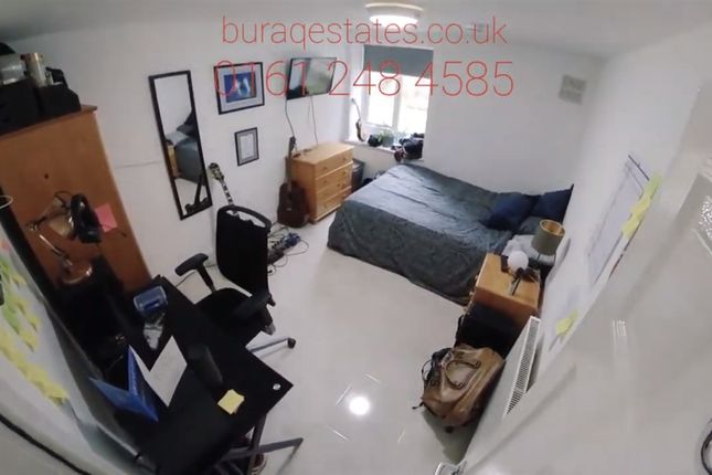 A Well-Lit Double Bedroom Featuring A Comfortable ...