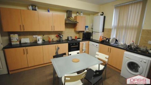 Bright And Clean Kitchen With Ample Cabinetry, A d...