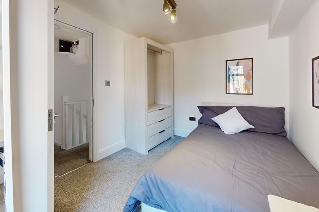 A Bright And Tidy Double Bedroom With Modern Decor...