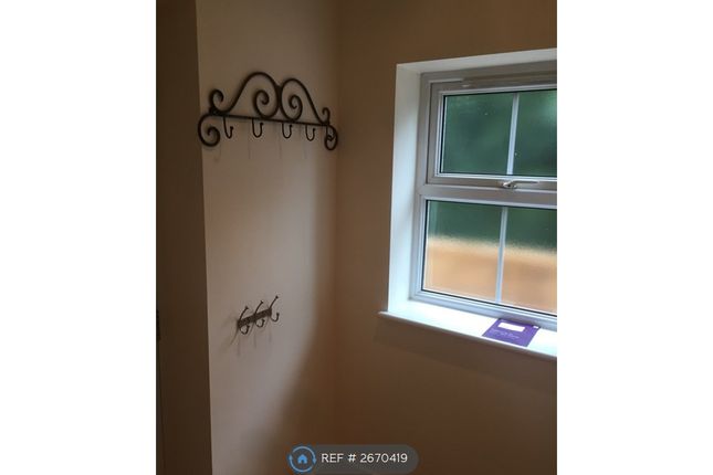 Just To Left Of Front Door