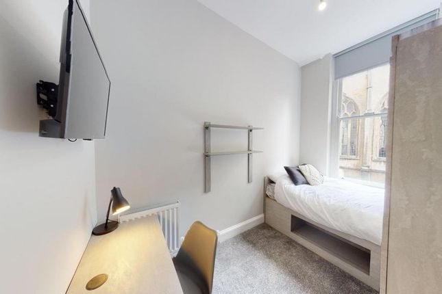 A Bright And Inviting Double Bedroom Featuring A c...