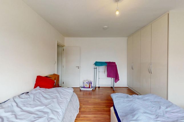 A Bright And Tidy Double Bedroom Featuring Two Sin...