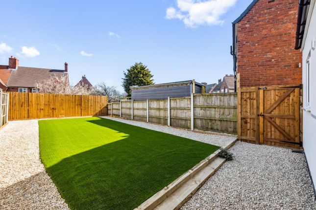 A Beautifully Maintained Garden Space Featuring vi...