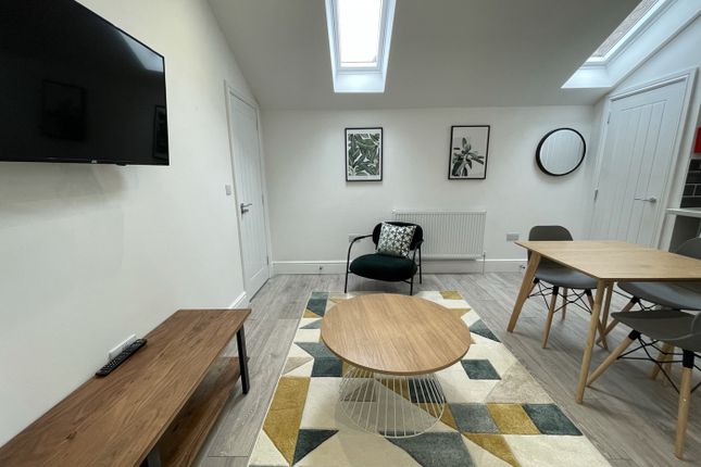 A Bright And Stylish Large Modern Living Room Perf...