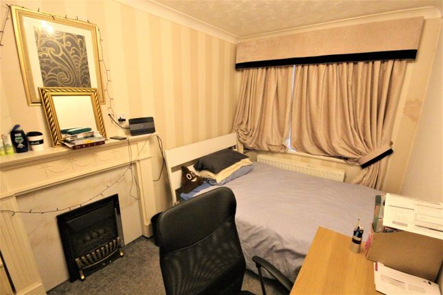 A Cozy And Inviting Double Bedroom Featuring A Com...