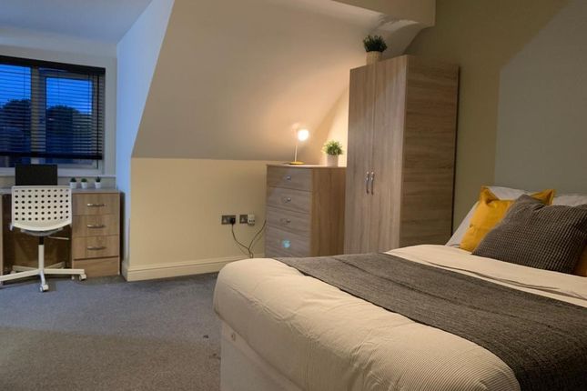 A Cozy And Well-Maintained Master Bedroom Featurin...