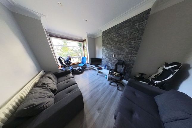 A Contemporary Living Room Featuring Comfortable S...