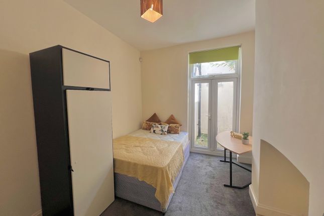 A Bright And Inviting Double Bedroom Featuring Mod...