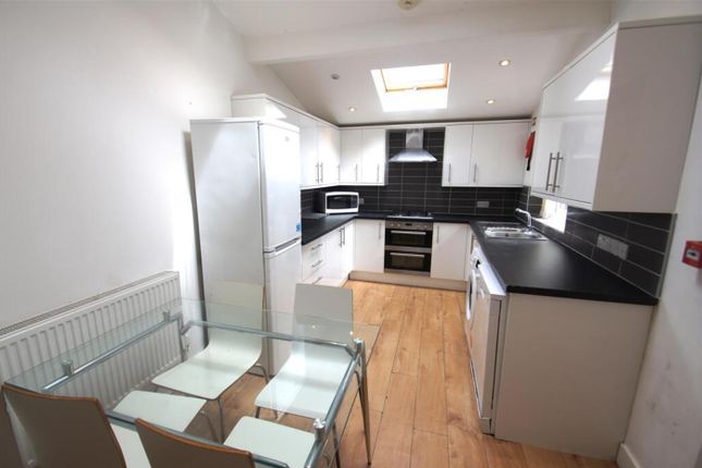 Bright And Modern Kitchen Featuring Sleek Cabinetr...
