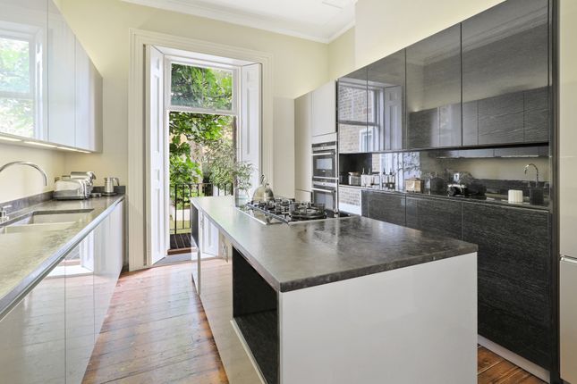 Town house for sale in Warwick Gardens, London