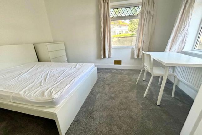 A Bright And Spacious Double Bedroom With A Modern...