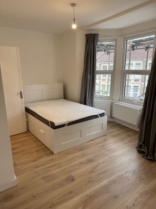 Bright And Inviting Double Bedroom Featuring Large...