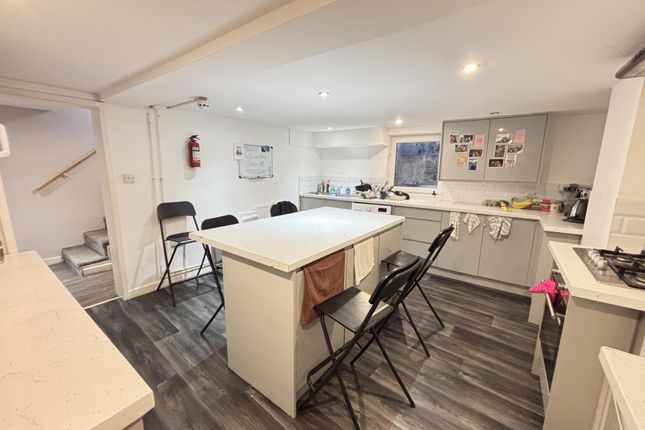 A Modern, Well-Lit Living Room With Ample Space, F...