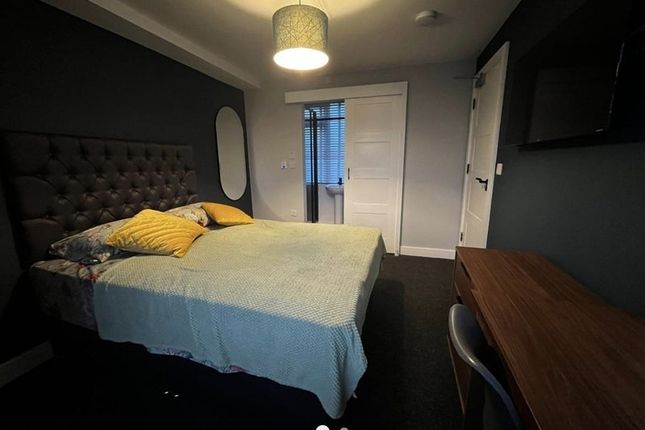 A Cozy And Well-Maintained Master Bedroom Featurin...