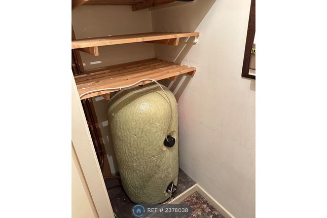 Water Tank With Shelves Above