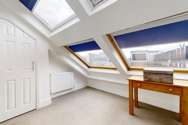 Bright And Airy Attic Master Bedroom Featuring Lar...