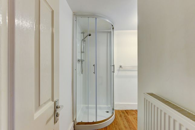 A Clean And Neatly Maintained Bathroom Featuring A...