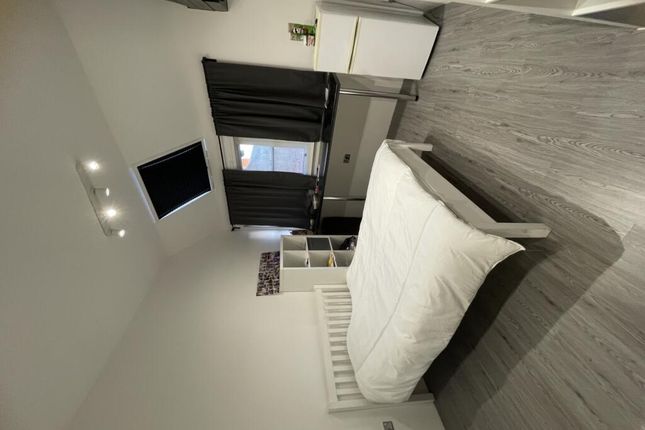 Bright And Modern Double Bedroom Featuring A Neatl...